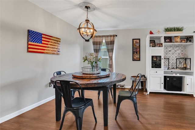 1203 Monterey Dr, Eustis, FL 32726 - dining space featuring a chandelier and dark wood-type flooring