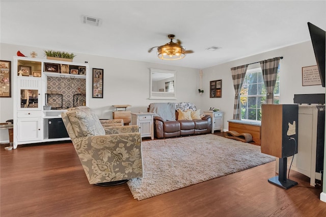 1203 Monterey Dr, Eustis, FL 32726 - living area featuring dark wood-style flooring and a ceiling fan