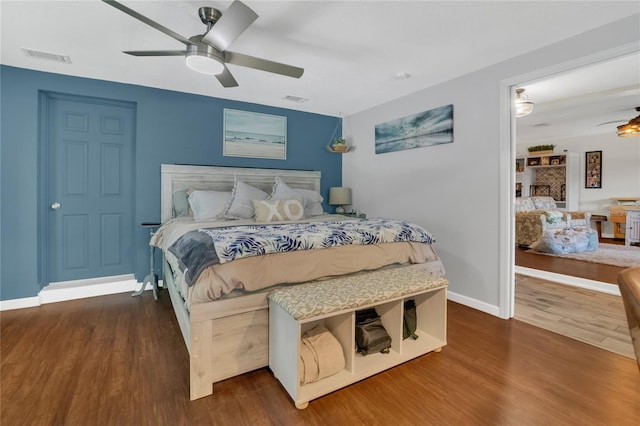 1203 Monterey Dr, Eustis, FL 32726 - bedroom featuring wood finished floors and ceiling fan
