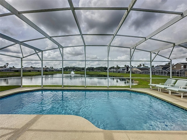 344 Bloomingdale Dr, Davenport, FL 33897 - swimming pool with a water view, glass enclosure, and a patio area