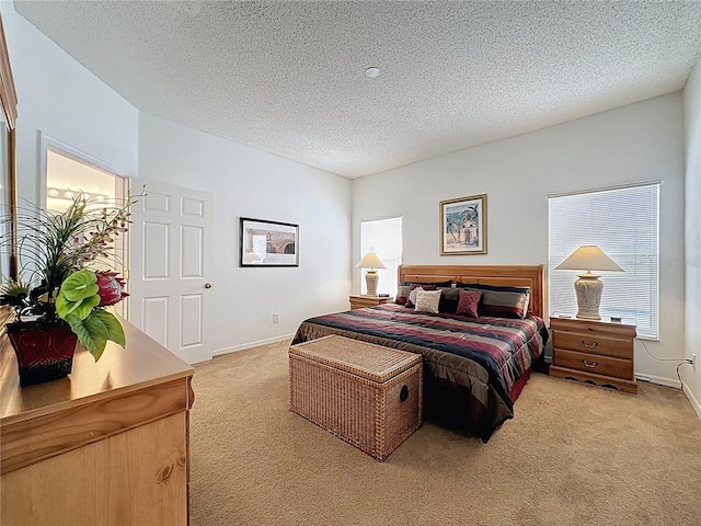 344 Bloomingdale Dr, Davenport, FL 33897 - bedroom with light carpet, a textured ceiling, and multiple windows