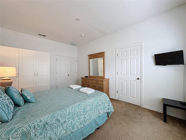 344 Bloomingdale Dr, Davenport, FL 33897 - bedroom featuring carpet floors and a textured ceiling