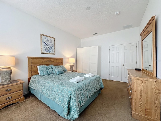 344 Bloomingdale Dr, Davenport, FL 33897 - bedroom with dark colored carpet and a textured ceiling