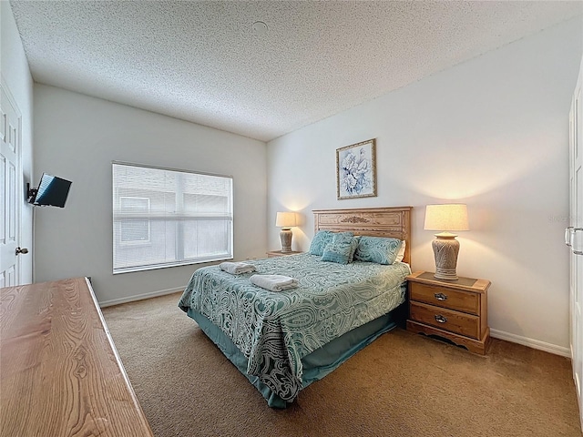 344 Bloomingdale Dr, Davenport, FL 33897 - carpeted bedroom featuring a textured ceiling and baseboards