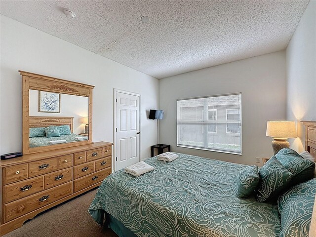 344 Bloomingdale Dr, Davenport, FL 33897 - bedroom featuring carpet flooring and a textured ceiling