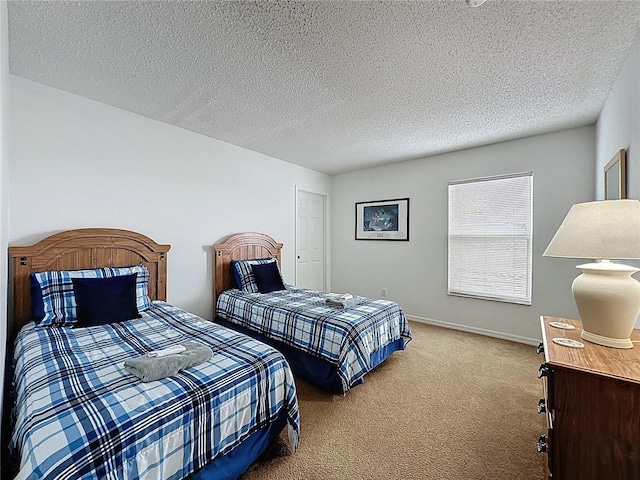 344 Bloomingdale Dr, Davenport, FL 33897 - carpeted bedroom featuring a textured ceiling and baseboards