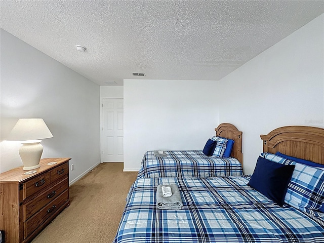 344 Bloomingdale Dr, Davenport, FL 33897 - bedroom with light carpet and a textured ceiling