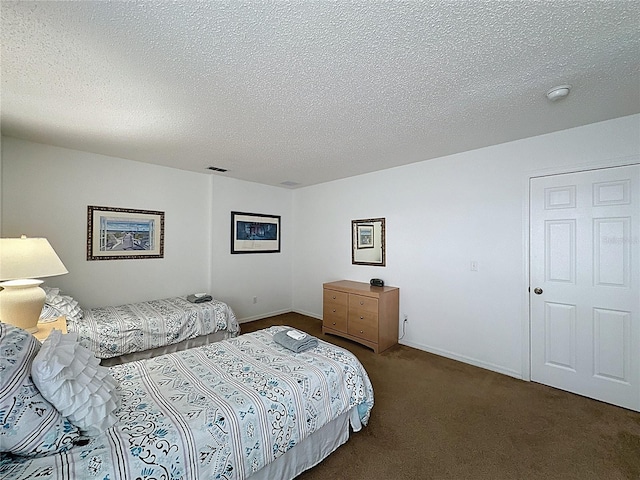 344 Bloomingdale Dr, Davenport, FL 33897 - carpeted bedroom with a textured ceiling