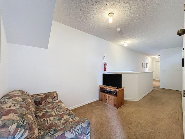 344 Bloomingdale Dr, Davenport, FL 33897 - living area with light colored carpet, a textured ceiling, and an upstairs landing