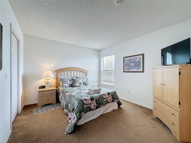 344 Bloomingdale Dr, Davenport, FL 33897 - bedroom featuring carpet flooring and a textured ceiling