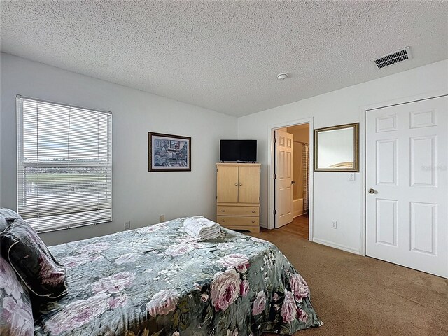 344 Bloomingdale Dr, Davenport, FL 33897 - bedroom with carpet and a textured ceiling
