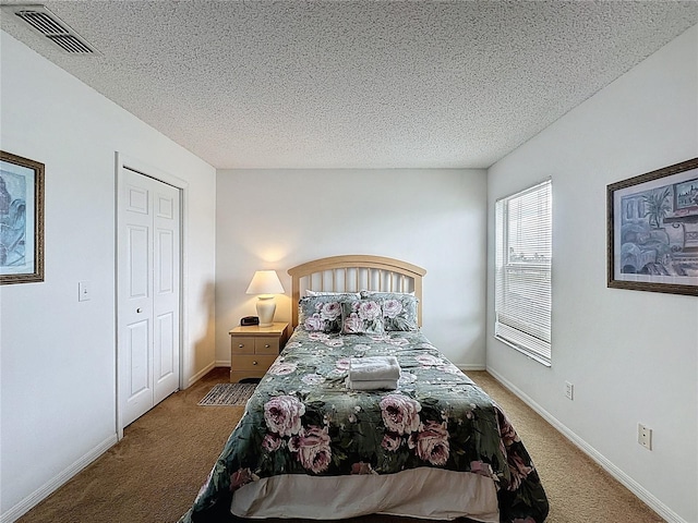 344 Bloomingdale Dr, Davenport, FL 33897 - carpeted bedroom featuring a textured ceiling