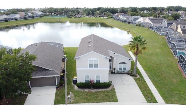 344 Bloomingdale Dr, Davenport, FL 33897 - aerial view of residential area with a large body of water