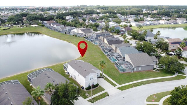 344 Bloomingdale Dr, Davenport, FL 33897 - aerial view of residential area with a large body of water