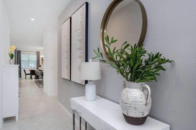 8937 Amelia Downs Trl, Kissimmee, FL 34747 - hall with baseboards and light tile patterned floors