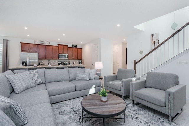 8937 Amelia Downs Trl, Kissimmee, FL 34747 - living room with recessed lighting and stairs