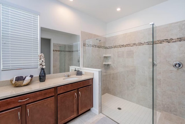8937 Amelia Downs Trl, Kissimmee, FL 34747 - bathroom featuring walk in shower, vanity, recessed lighting, and tile patterned floors