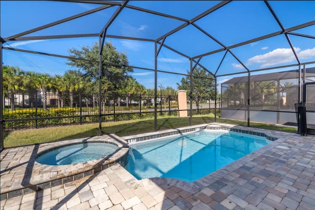 8937 Amelia Downs Trl, Kissimmee, FL 34747 - view of swimming pool featuring a patio area, a pool with connected hot tub, and a lanai