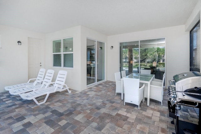 8937 Amelia Downs Trl, Kissimmee, FL 34747 - view of patio with grilling area and outdoor dining area