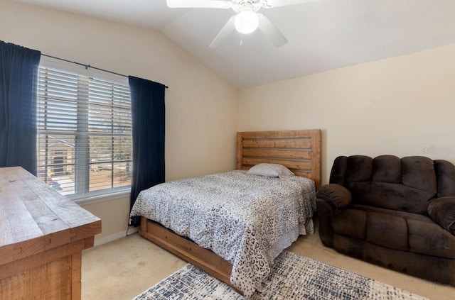 877 Scrub Jay Way, Davenport, FL 33896 - bedroom with light carpet, vaulted ceiling, and a ceiling fan