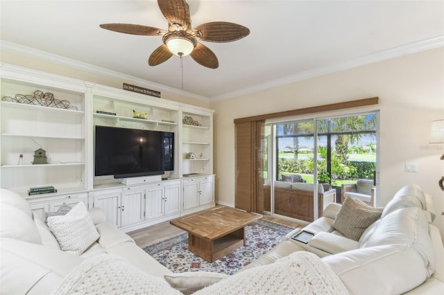 217 Sorrento Rd, Poinciana, FL 34759 - living room with ornamental molding, light wood-type flooring, and a ceiling fan