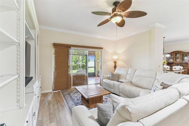 217 Sorrento Rd, Poinciana, FL 34759 - living area featuring crown molding, ceiling fan, and light wood-style floors