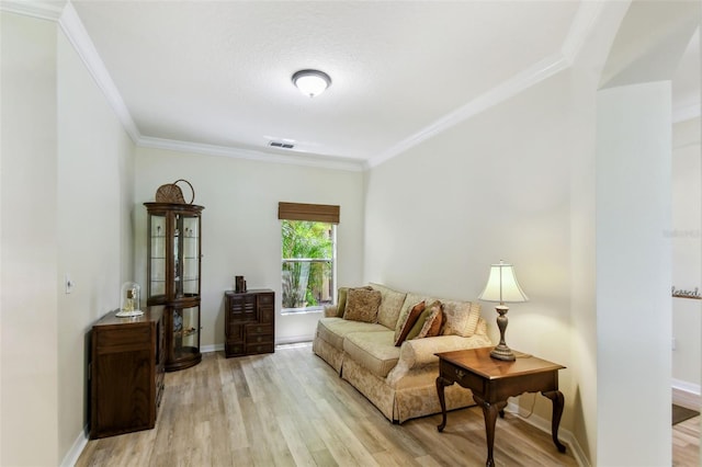 217 Sorrento Rd, Poinciana, FL 34759 - living room with crown molding and light wood finished floors