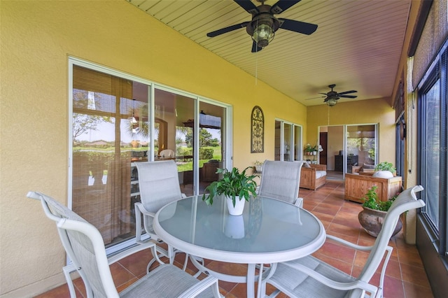 217 Sorrento Rd, Poinciana, FL 34759 - sunroom with ceiling fan and outdoor dining space