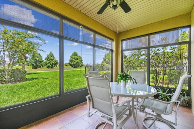 217 Sorrento Rd, Poinciana, FL 34759 - sunroom with ceiling fan, plenty of natural light, and outdoor dining area