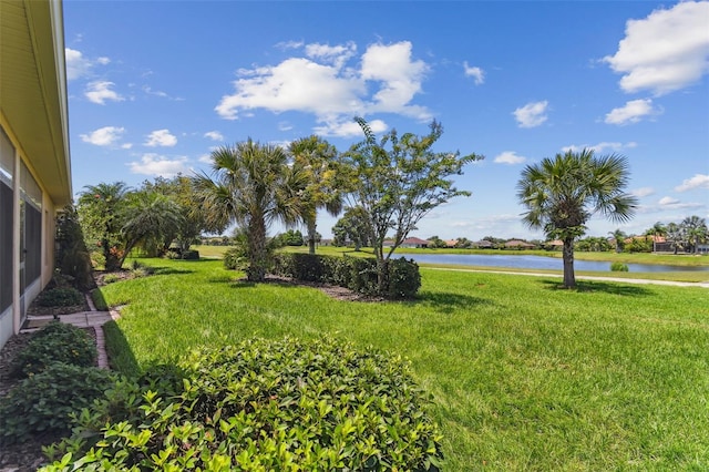 217 Sorrento Rd, Poinciana, FL 34759 - view of green lawn with a water view