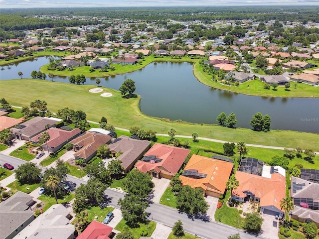 217 Sorrento Rd, Poinciana, FL 34759 - aerial perspective of suburban area with a large body of water and a golf club