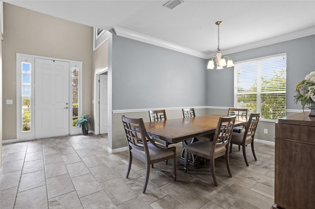 12353 Hammock Hill Dr, Clermont, FL 34711 - dining room with a chandelier and crown molding