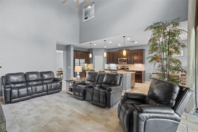 12353 Hammock Hill Dr, Clermont, FL 34711 - living room with a high ceiling and recessed lighting