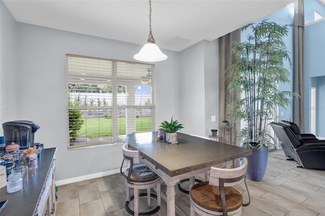 12353 Hammock Hill Dr, Clermont, FL 34711 - dining space featuring baseboards