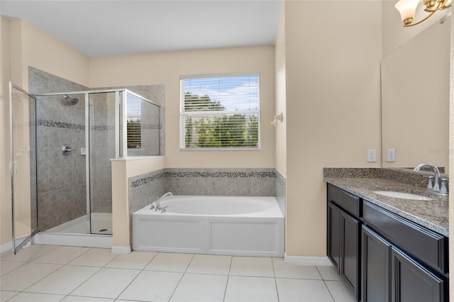 12353 Hammock Hill Dr, Clermont, FL 34711 - bathroom featuring a bath, tile patterned flooring, a shower stall, and vanity