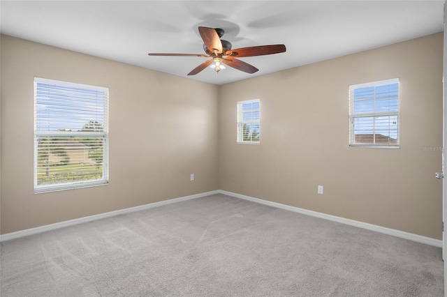 12353 Hammock Hill Dr, Clermont, FL 34711 - spare room with healthy amount of natural light, light colored carpet, and ceiling fan
