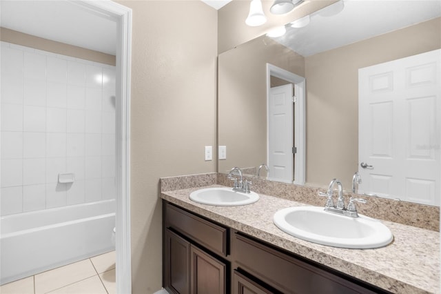 12353 Hammock Hill Dr, Clermont, FL 34711 - full bath with double vanity, tile patterned flooring, and shower / tub combination