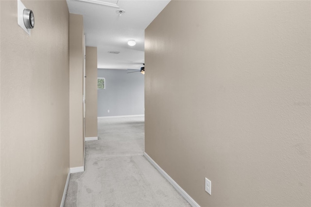 12353 Hammock Hill Dr, Clermont, FL 34711 - hall with baseboards and light colored carpet