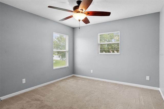 12353 Hammock Hill Dr, Clermont, FL 34711 - empty room with ceiling fan, plenty of natural light, and carpet floors