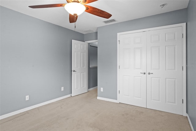 12353 Hammock Hill Dr, Clermont, FL 34711 - unfurnished bedroom featuring carpet flooring, a closet, and a ceiling fan