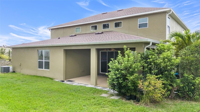 12353 Hammock Hill Dr, Clermont, FL 34711 - rear view of property featuring a patio, stucco siding, a yard, and a shingled roof