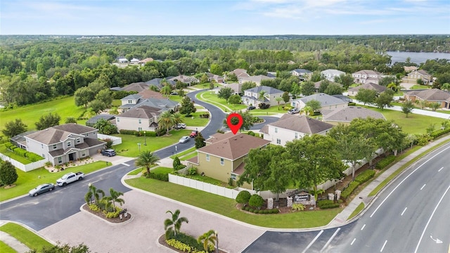 12353 Hammock Hill Dr, Clermont, FL 34711 - aerial view of residential area with a heavily wooded area and a nearby body of water