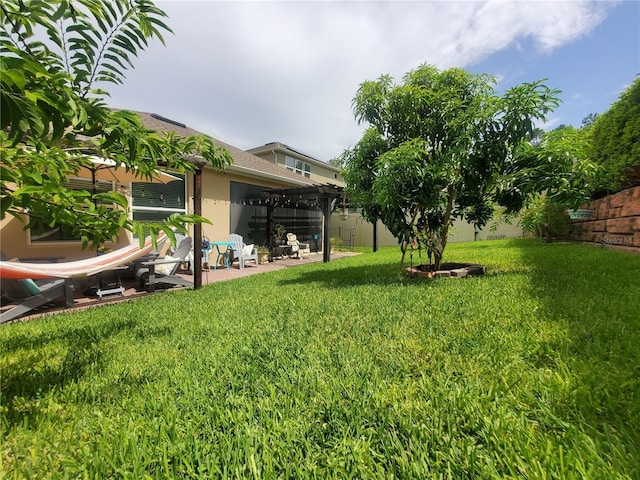 1456 Sourwood Dr, Ocoee, FL 34761 - fenced backyard featuring a pergola and a patio