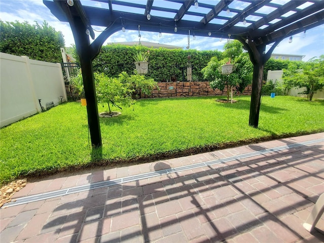 1456 Sourwood Dr, Ocoee, FL 34761 - fenced backyard featuring a pergola and a patio area