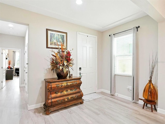 1456 Sourwood Dr, Ocoee, FL 34761 - foyer featuring light wood finished floors and recessed lighting