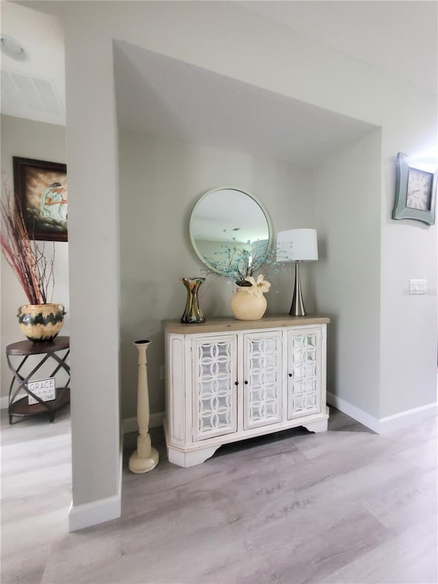 1456 Sourwood Dr, Ocoee, FL 34761 - hall featuring wood finished floors and baseboards