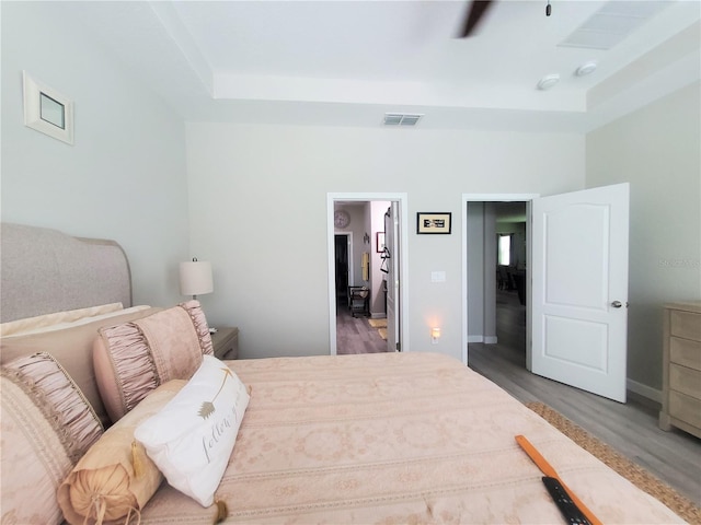 1456 Sourwood Dr, Ocoee, FL 34761 - bedroom featuring wood finished floors