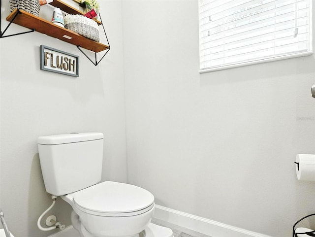 1456 Sourwood Dr, Ocoee, FL 34761 - bathroom with toilet and baseboards