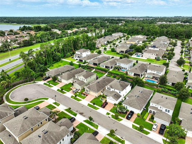 1456 Sourwood Dr, Ocoee, FL 34761 - aerial view of property and surrounding area with nearby suburban area and a large body of water