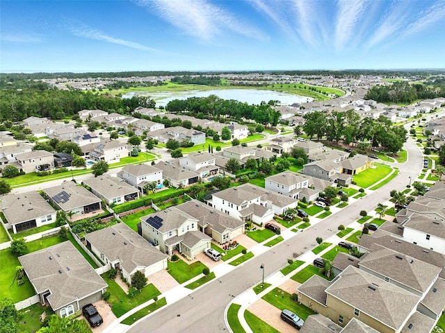 1456 Sourwood Dr, Ocoee, FL 34761 - aerial perspective of suburban area with a large body of water